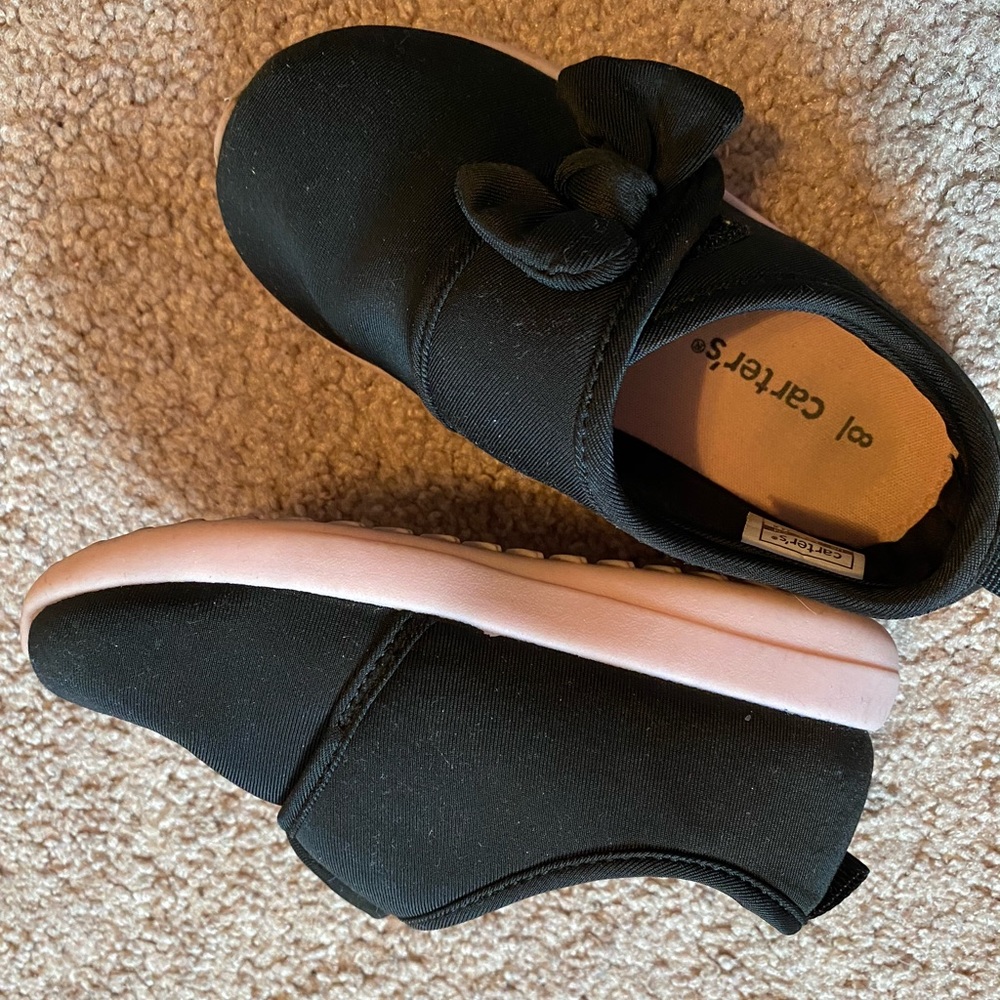 Black bow sneakers